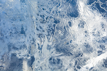The texture of the ice. The frozen water.Winter background    