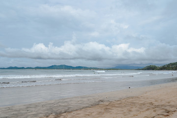 beautiful beach with cloudy sky