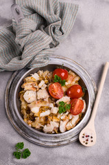 Slices of fried fish with vegetables