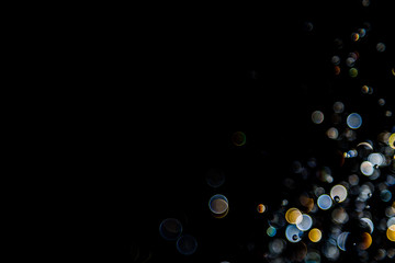 bokeh of water drops levitating in the air reflection