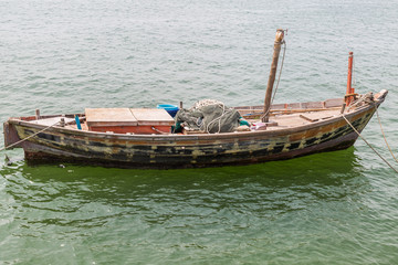 Orange wood fishing boat