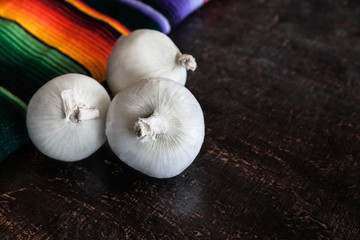 Fresh Raw White Onion On Wooden Table