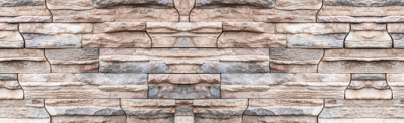 Panorama of Brown stone wall background and texture