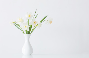 Fototapeta na wymiar spring flowers in white vase