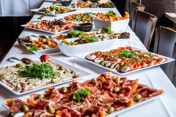 Foto op Plexiglas Party Brunch big Buffet table setting with Food Meat Vegetables © CL-Medien