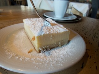 portion of a cheesecake on a plate