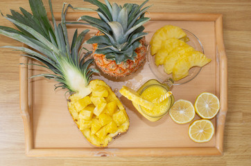 Still life. Pineapple juice, smoothies with fresh pineapple for breakfast in the morning on a...