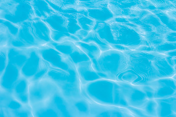swimming pool with sunny reflections