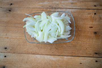 sliced onion on board