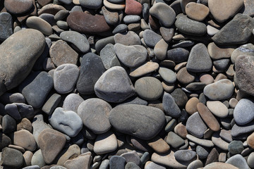 Round peeble stones background in close up