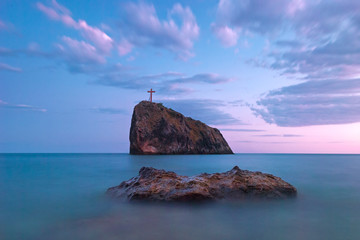 Crimea Fiolent sea ocean cliff sunset stones rock holy phenomenon landscape clouds sky cross on...