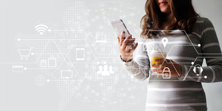Woman using mobile payments for online shopping and icon customer network connection. Digital marketing, m-banking and omni channel.