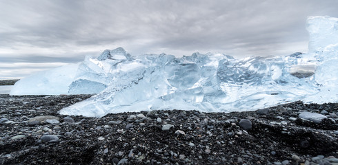 An iceberg washed up on a black sand beach in Iceland.
