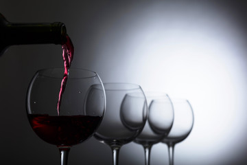 Fototapeta na wymiar Glass and bottle of red wine.