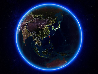 Fototapeta na wymiar Taiwan on Earth from space at night