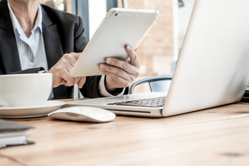 Fototapeta premium Businessman working at business office table. Selective focus.