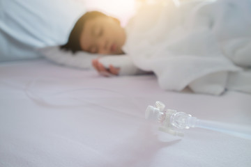 Obraz na płótnie Canvas Asian patient boy lying at hospital