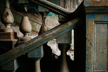 Old staircase with columns of different colors