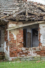 Fototapeta na wymiar Abandoned destroyed house in the village