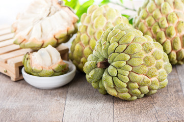 fresh sugar apple fruit(Custard Apple),sweetsop on wooden table background