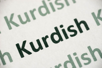 word Kurdish  language printed on paper macro