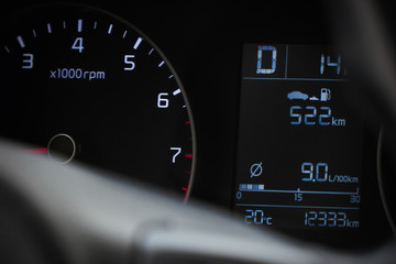 Photo speedometer in the car on the dashboard