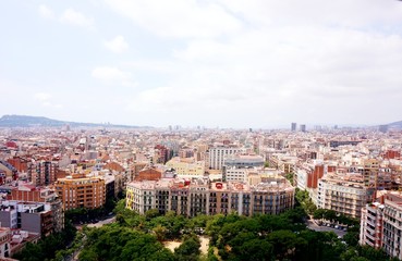 Fototapeta na wymiar 2018. View on the roofs of Barcelona from one of the city's observation sites.
