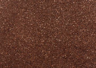 Ground coffee as abstract background. Top view.