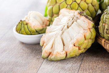 fresh sugar apple fruit(Custard Apple),sweetsop on wooden table background