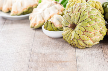 fresh sugar apple fruit(Custard Apple),sweetsop on wooden table background
