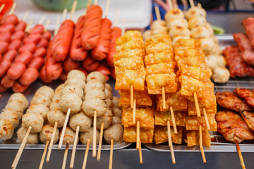 Fried wonton and pork ball, street food at market.