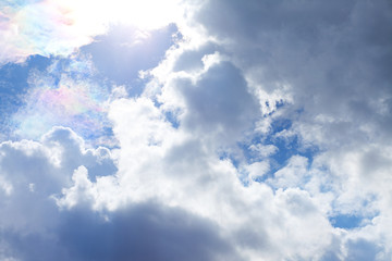 White fluffy clouds in the blue sky