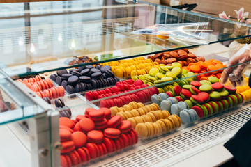 french macarons for sale.cookies in the shop, on the storefront