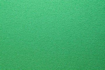 green textile background.Fabric surface