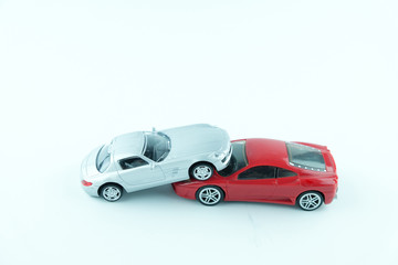Obraz na płótnie Canvas Close up of two cars accident, car crash insurance.Transport and accident concept on white background..