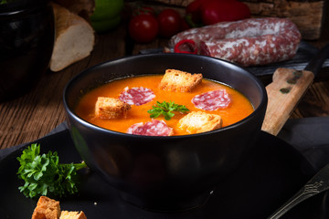Hungarian paprika cream soup with spicy sausage