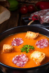 Hungarian paprika cream soup with spicy sausage
