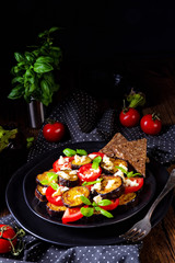 Eggplant grilled with aromatic feta cheese and tomatoes