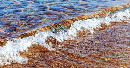 Blue clear water. Sea, lake, sun, beach, vacation Background for inserting images and text. Tourism, travel.