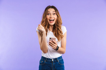 Portrait of an excited young girl standing