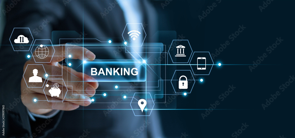 Poster businessman holding word banking in hand with icon network connection on virtual screen dark backgro