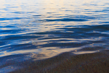 Blue clear water. Sea, lake, sun, beach, vacation Background for inserting images and text....