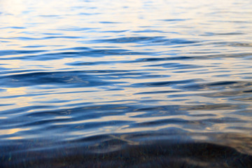 Blue clear water. Sea, lake, sun, beach, vacation Background for inserting images and text....