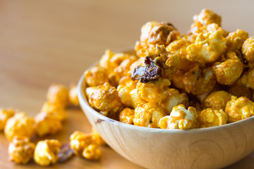 Closeup the popcorn cheese on the wood table