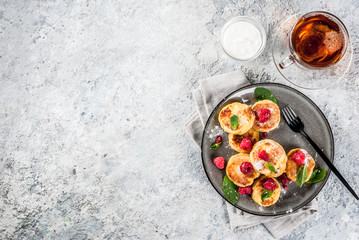 Cheese pancakes with raspberry