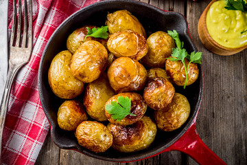 Baked whole young potatoes