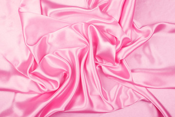 Pink luxury satin fabric texture for background