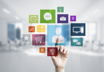 Modern office interior and close of businesswoman hand choosing 