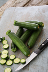 preparing baby courgette