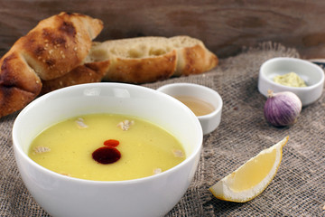Turkish soup with vinegar and garlic on the table